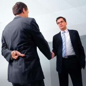 handshake with fingers crossed behind back