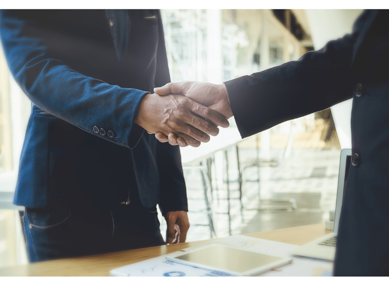 Lawyer and Client Shaking Hands