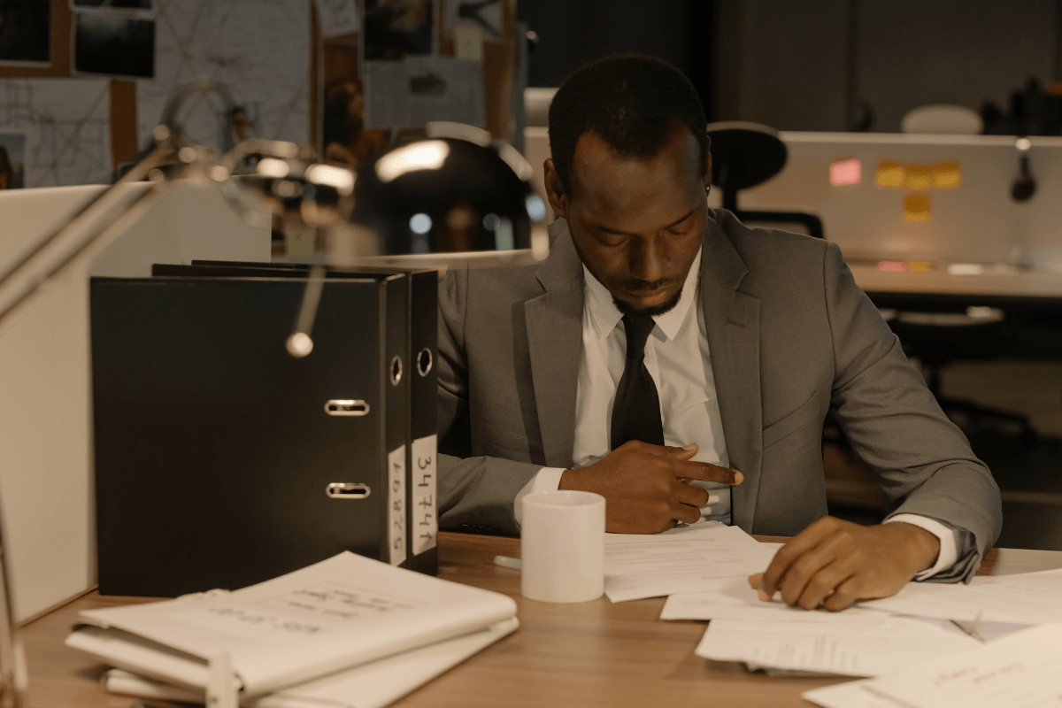 Investigator Looking at Paperwork
