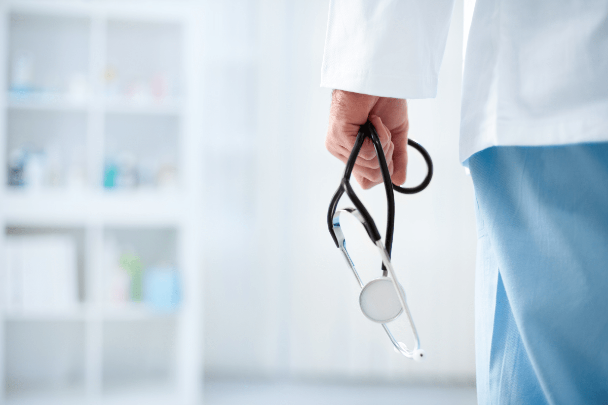 Doctor Walking with a Stethascope