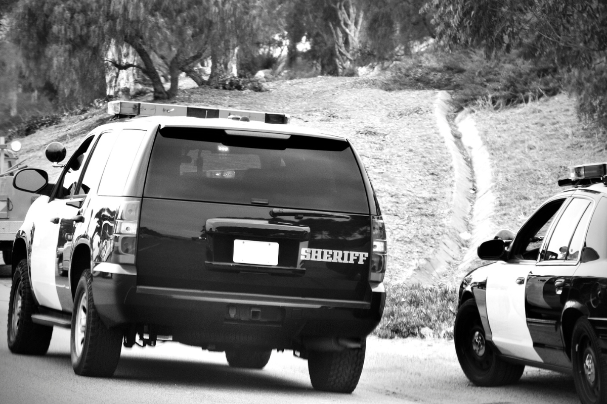 Police SUV and Car