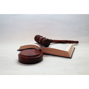 Judge's gavel on top of a book.