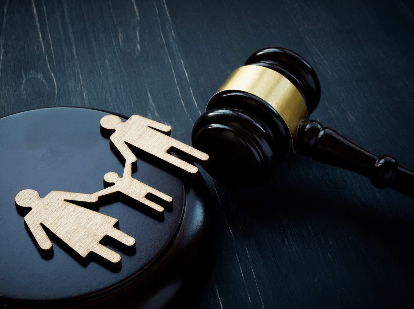 Family silhouette cutout with a gavel.